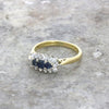Pre Owned 18ct Yellow Gold Sapphire and 0.24cts Diamond Cluster Ring | H&H
