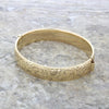 9ct Yellow Gold Metal Core Hinged Patterned Bangle | H&H Jewellers