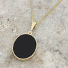 Whitby Jet and Turquoise 9ct Yellow Gold Oval Reversible Pendant