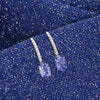 18ct White Gold 1.49ct Tanzanite and 0.09ct Diamond Drop Earrings