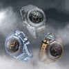 Three transparent Casio watches with different color schemes on a foggy background