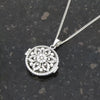 Sterling Silver Cubic Zirconia Round Flower Design Locket and Chain