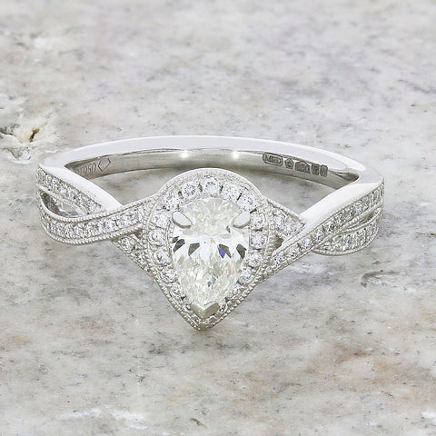 Pre Owned Platinum Pear Shape 1.00cts Diamond Halo Ring